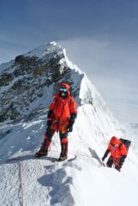 Vanessa B. and Greg B. on the summit ridge of Everest, Credit: Bill Allen.