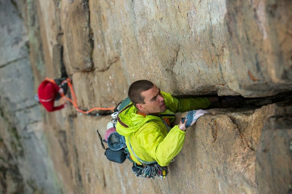 Tommy Caldwell belaying Josh Wharton on Hearts & Aarows 5.12b, The Diamond, Longs Peak, Rocky Mountain National Park, CO. The two reached the route by first climbing Babies R' Us (5.12-). By Andrew Burr