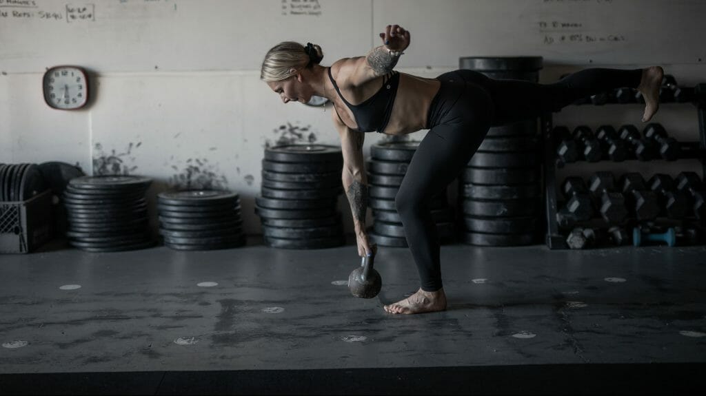 woman training with kettlebell