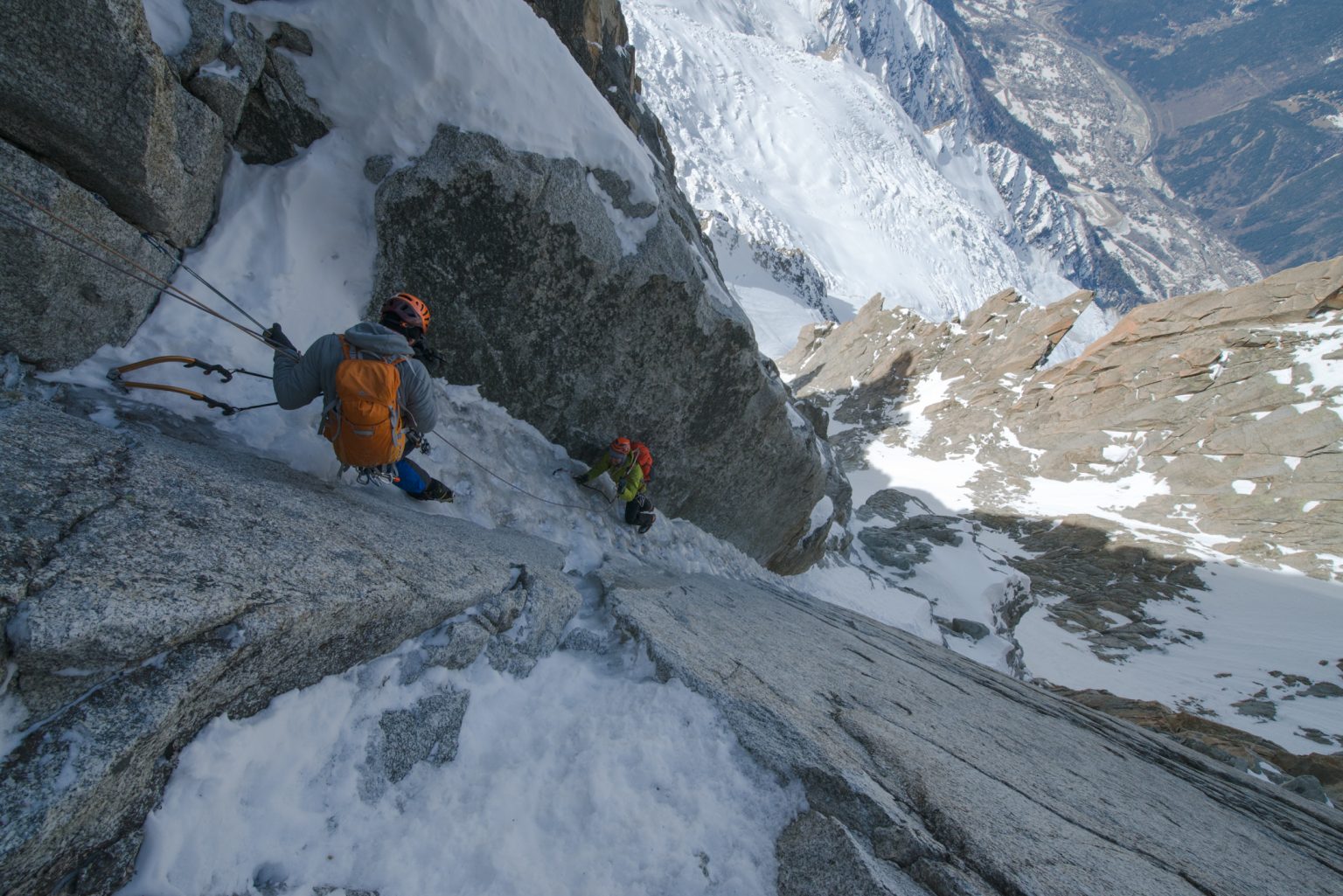 Alpinists during climbing