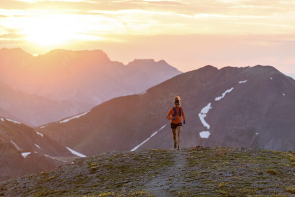 An ultrarunner during sunset