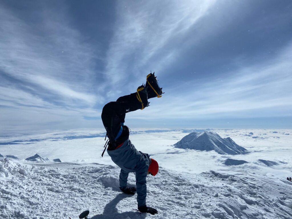 After summitting Denali, Sam still had the energy to pop a handstand.