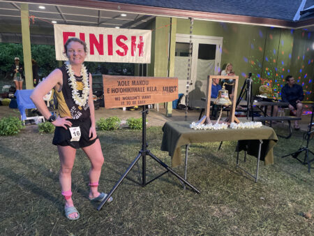 Alyssa at the finish line of the HURT 100 race. Photo credit: Grace Albertson