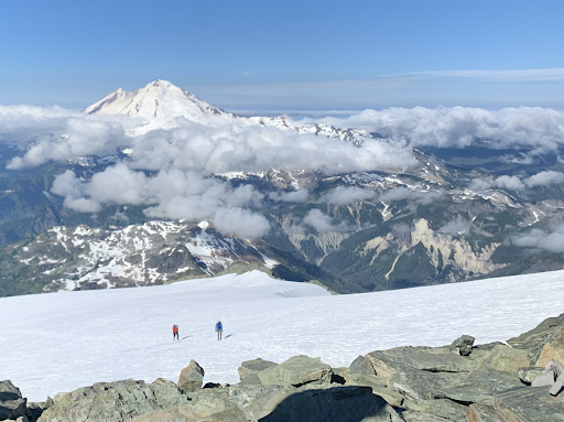 View of Mount Shuksan descent in 2020 with climbers in the distance.