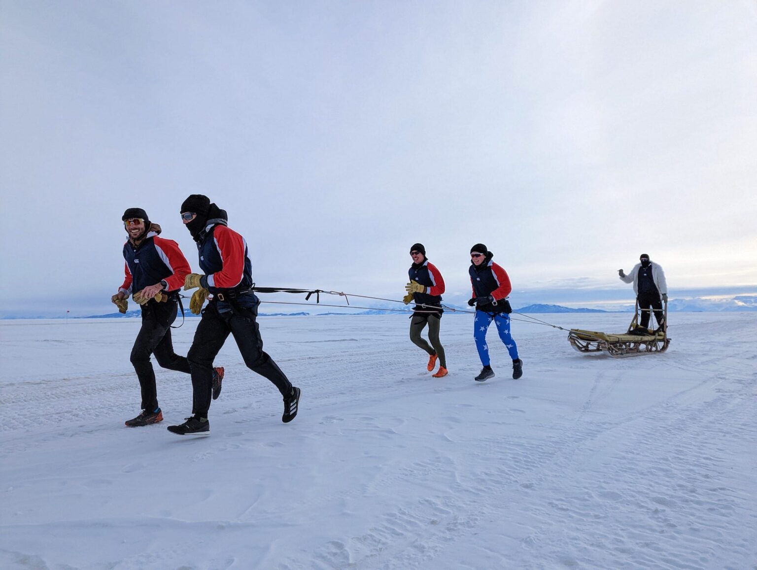 Participating in a 5-km man-hauling competition on the Ross Ice Shelf - USA vs. New Zealand.