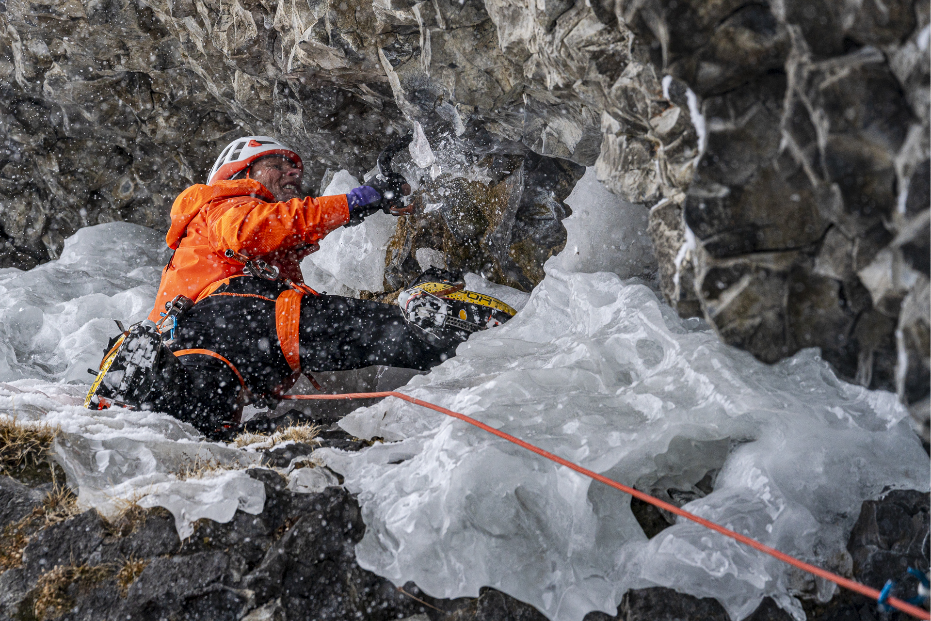 Ice climbing in Hyalite Canyon Montana with locals Conrad Anker and Manoah Ainuu. In the last 10 day period winter has brought over 6 ft of new snow to the mountains in the area. Manoah and Conrad get out to ice climb and "feed the rat" as Conrad likes to say, meaning he has gotten his climbing pitches in and fed his soul feeling reenergized for what life brings. Over the years, Conrad has helped to mentor a countless number of young climber, including Manoah. The pair climbed a 35M M4+ called "The Thrill is Gone" - Salish Kootenai, Apsaalooke and Cheyenne and many other ancestral lands.