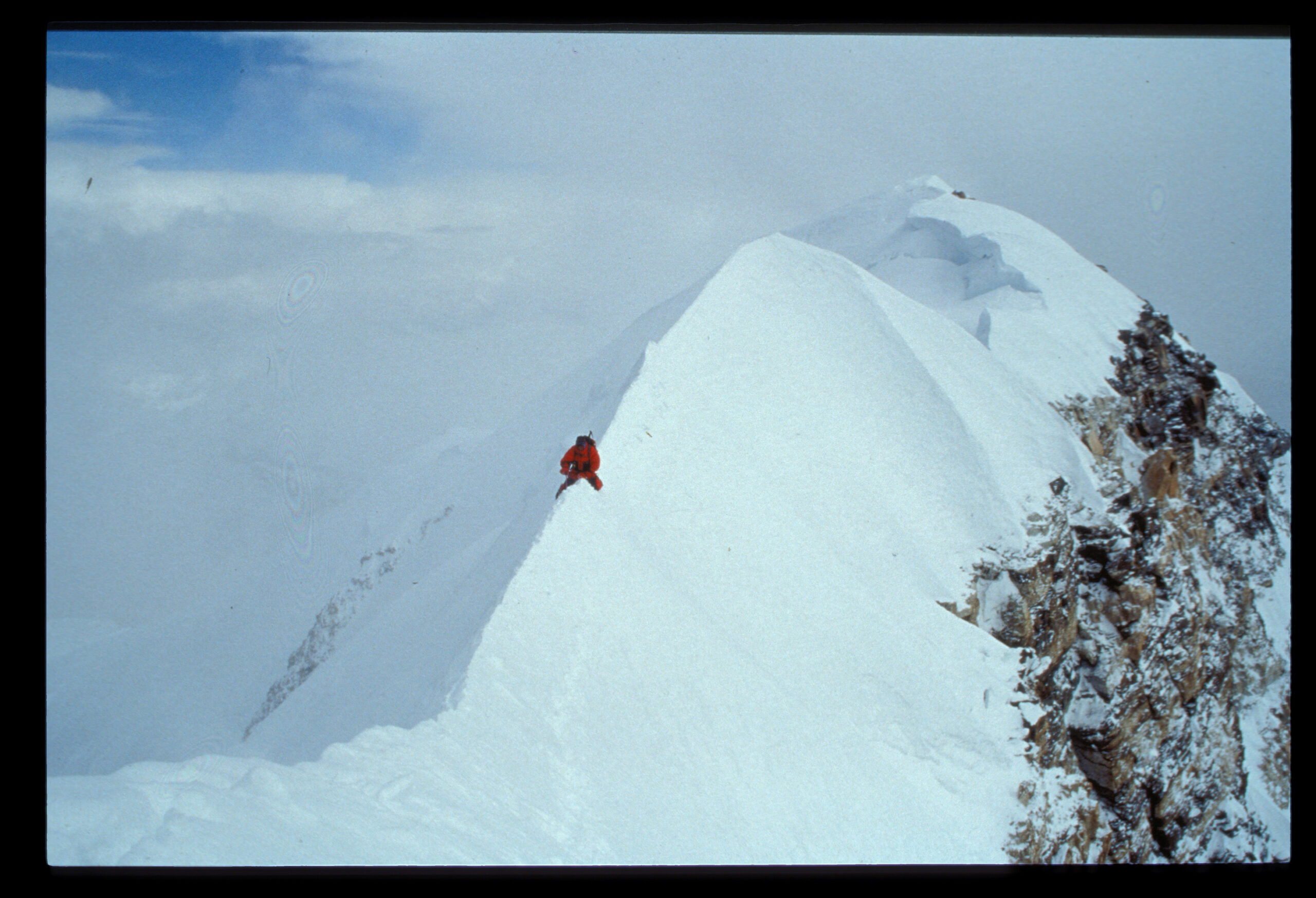 EdViesturs_VOM_Viesturs returning from main summit along shishapangma summit rridge as seen from Central summit