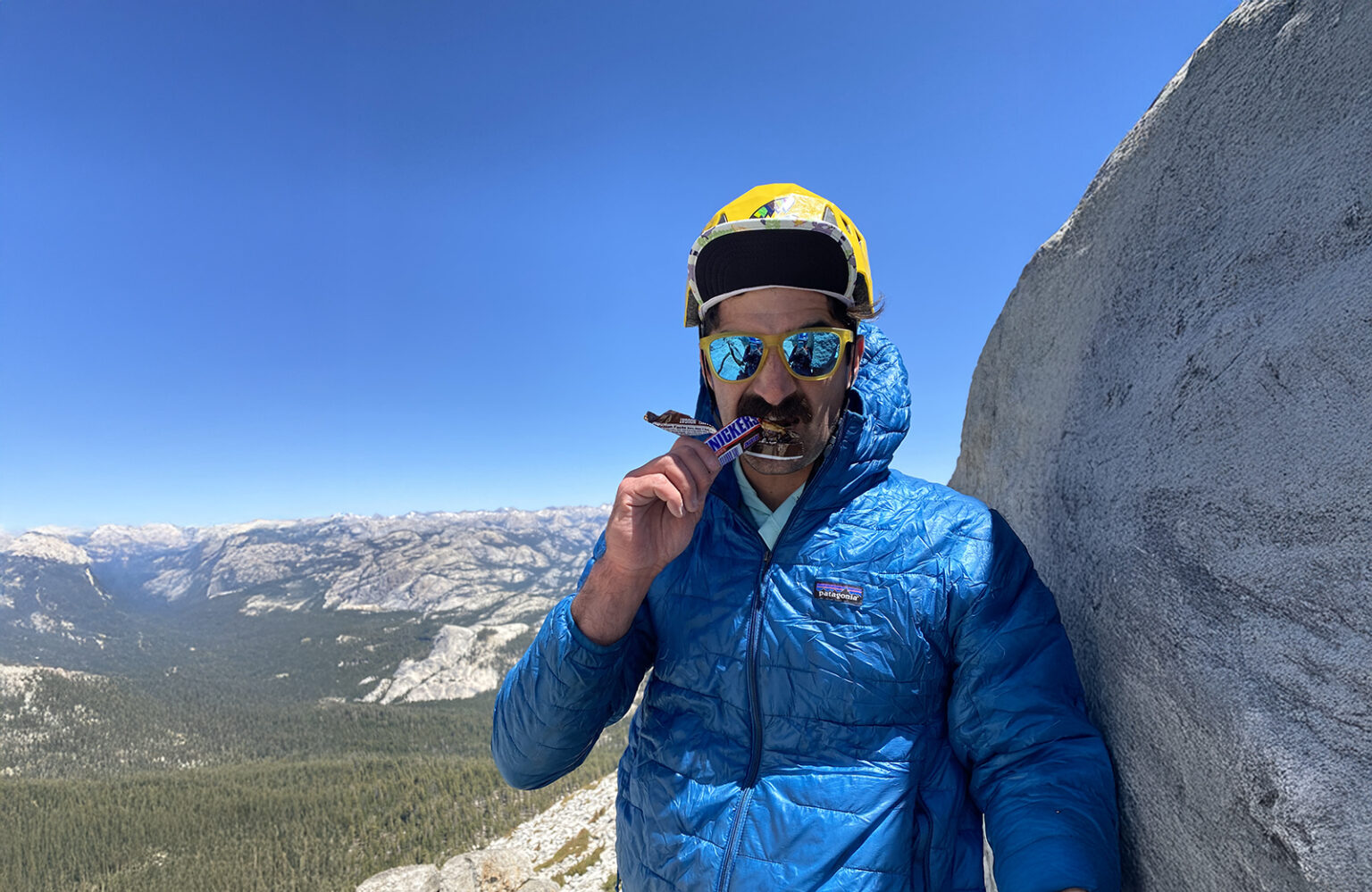 Nutrition Strategies to Aid Recovery for Mountain Athletes snickers snack break on the trail