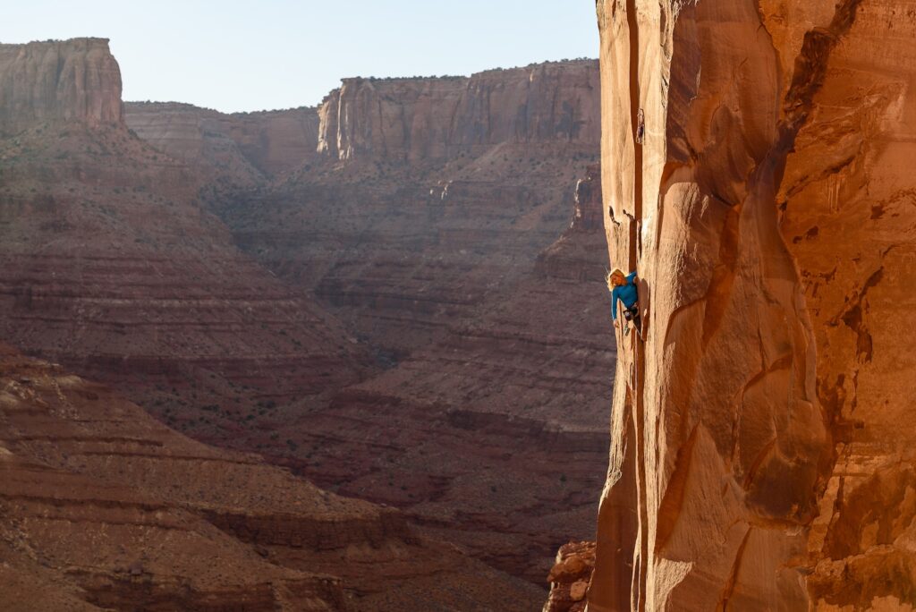 Pamela Shant Pack on the 2nd ascent of Head Stack 5.12 in Longs Canyon, Moab, Utah